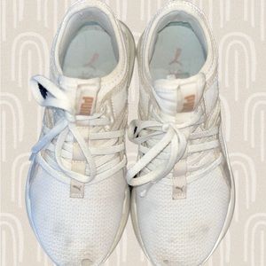 Puma white athletic shoes